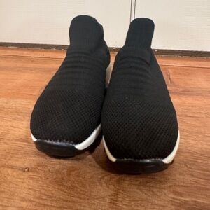 Black Slip-On Sneakers with Knit Fabric and White Sole​​​